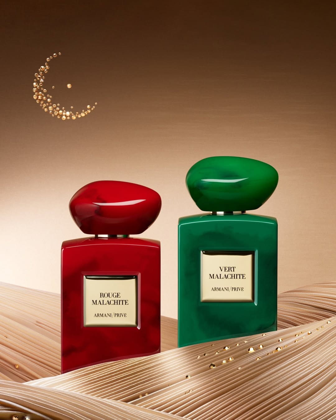 Armani Beauty Ramadan campaign product photo: ruby red, emerald green, jet black and gold, glass, studio light, image 1 of 3