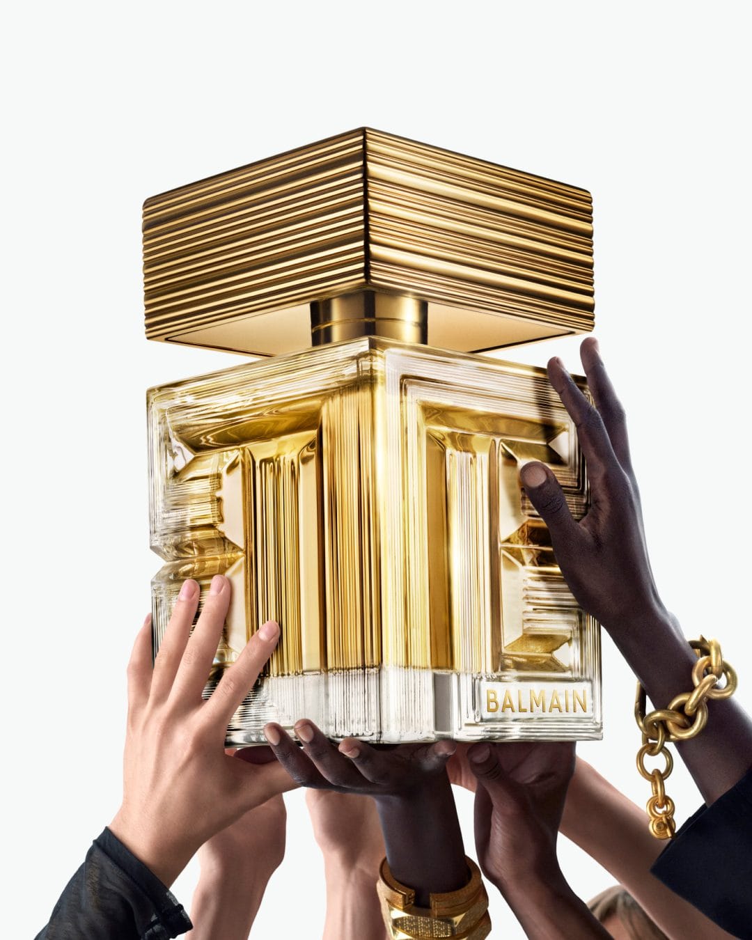 Balmain Beauty fragrance product photo: champagne gold and clear glass, glass, studio light