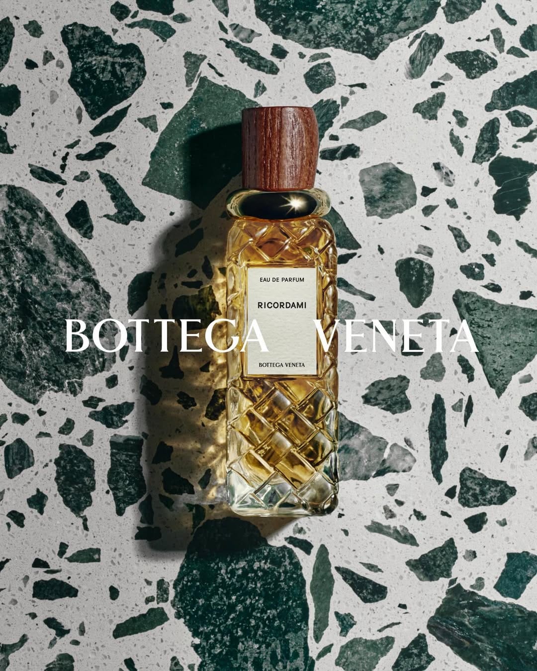 Bottega Veneta Alta Collection product photo: amber, walnut wood and clear cut glass, glass and stone, dramatic light, image 6 of 9
