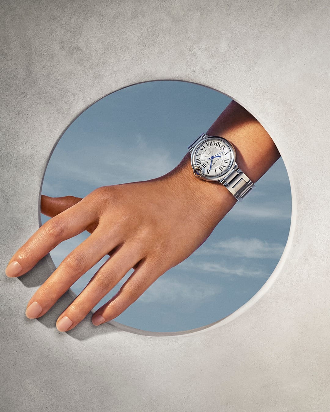 Cartier Ballon Bleu product photo: steel silver, pale blue and rose gold, metal, studio light, image 2 of 4
