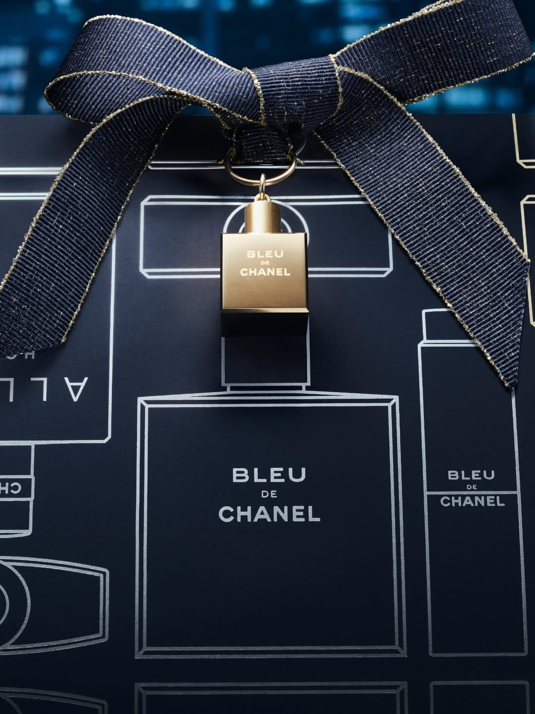 Chanel Bleu de Chanel product photo: midnight navy, black and brushed gold, glass, dramatic light, image 3 of 4