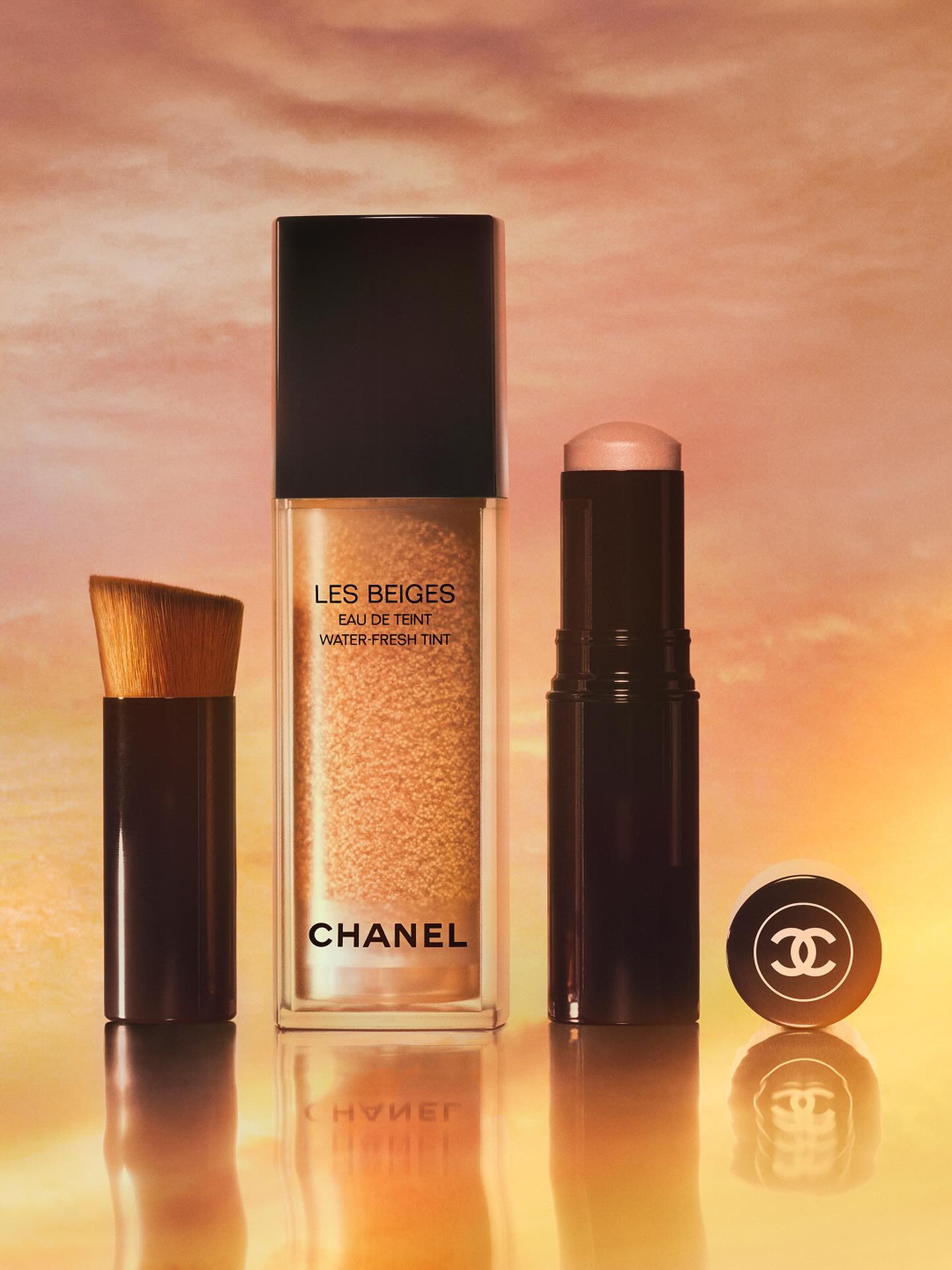 Chanel Les Beiges product photo: black, golden amber and peach glow, glass, natural light