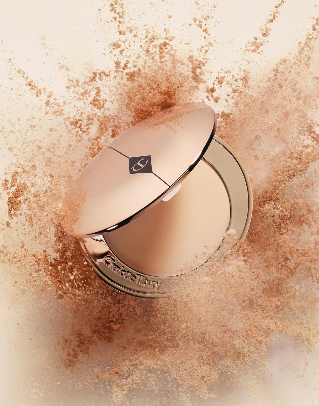 Charlotte Tilbury product photo: champagne beige, rose gold and bronze, metal, soft light, image 1 of 5