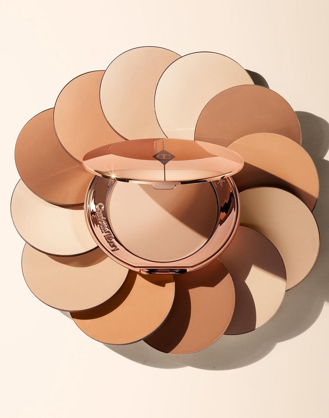 Charlotte Tilbury product photo: champagne beige, rose gold and bronze, metal, soft light, image 2 of 5
