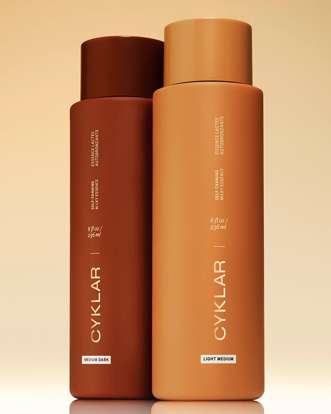 CYKLAR bodycare product photo: bronze brown, caramel tan and cream, plastic and skin, studio light, image 1 of 5