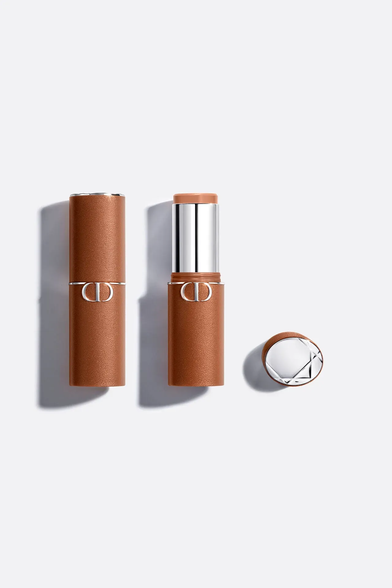 Dior Forever product photo: bronze, chrome silver and black, leather, soft light, image 5 of 5