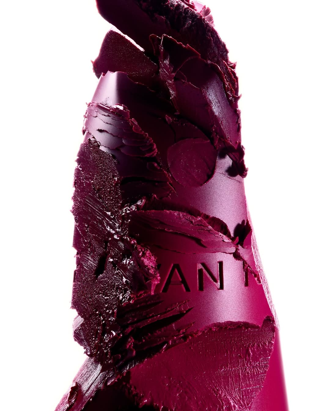 Dries Van Noten lipstick product photo: lipstick red, burnished gold and magenta berry, metal, studio light, image 3 of 6