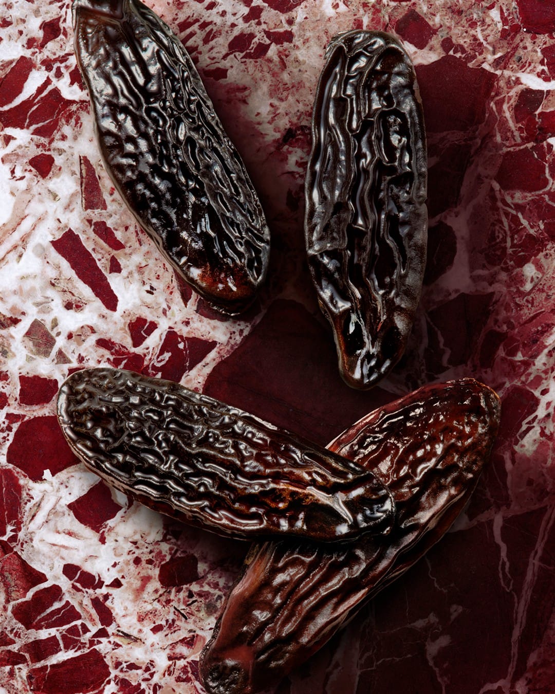 Gucci Guilty Absolu product photo: black glass, ruby red and amber, glass and stone, studio light, image 4 of 4