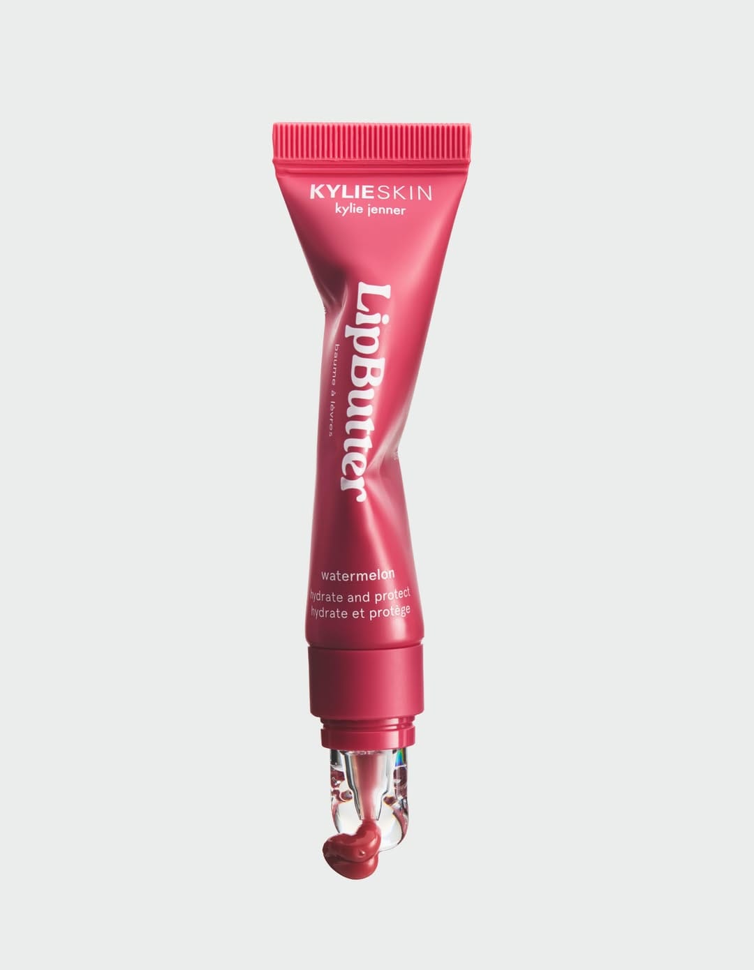 Kylie Cosmetics lip gloss product photo: raspberry pink and rose, plastic, soft light, image 1 of 3