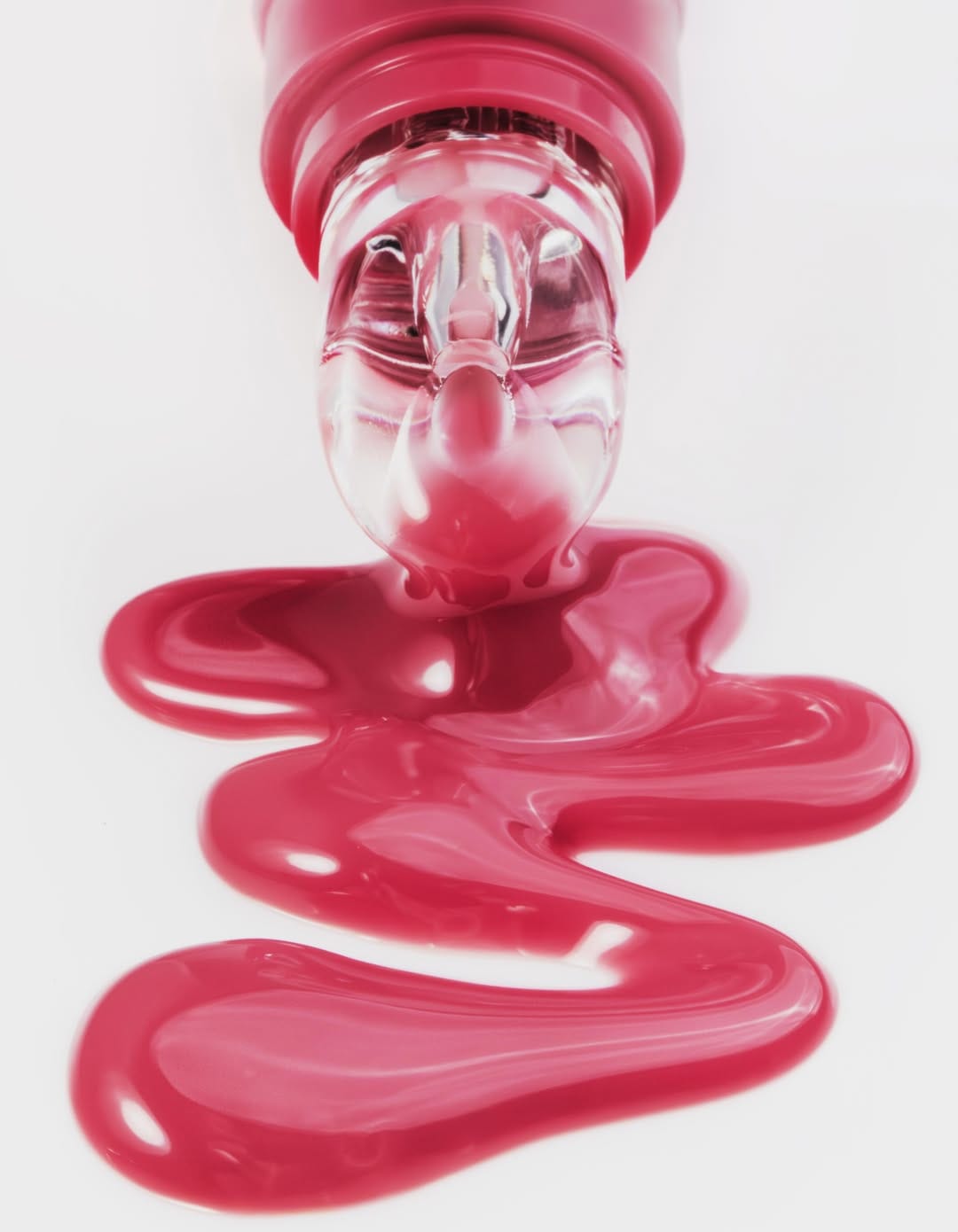 Kylie Cosmetics lip gloss product photo: raspberry pink and rose, plastic, soft light, image 2 of 3