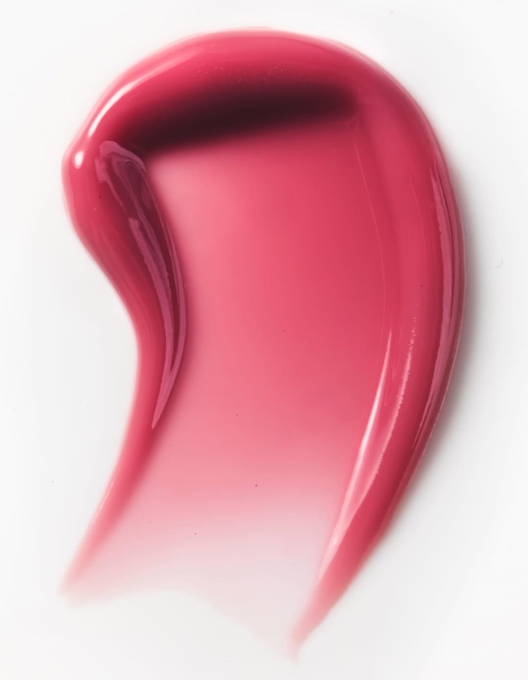Kylie Cosmetics lip gloss product photo: raspberry pink and rose, plastic, soft light, image 3 of 3