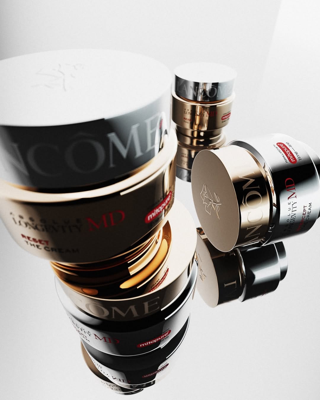 Lancôme anti-age product photo: chrome silver, black and champagne gold, metal, studio light, image 3 of 4