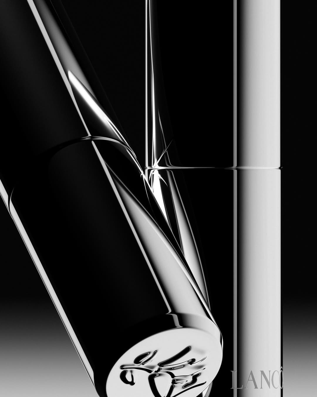 Lancôme lip balm product photo: chrome silver, black and lipstick red, metal, studio light, image 3 of 3