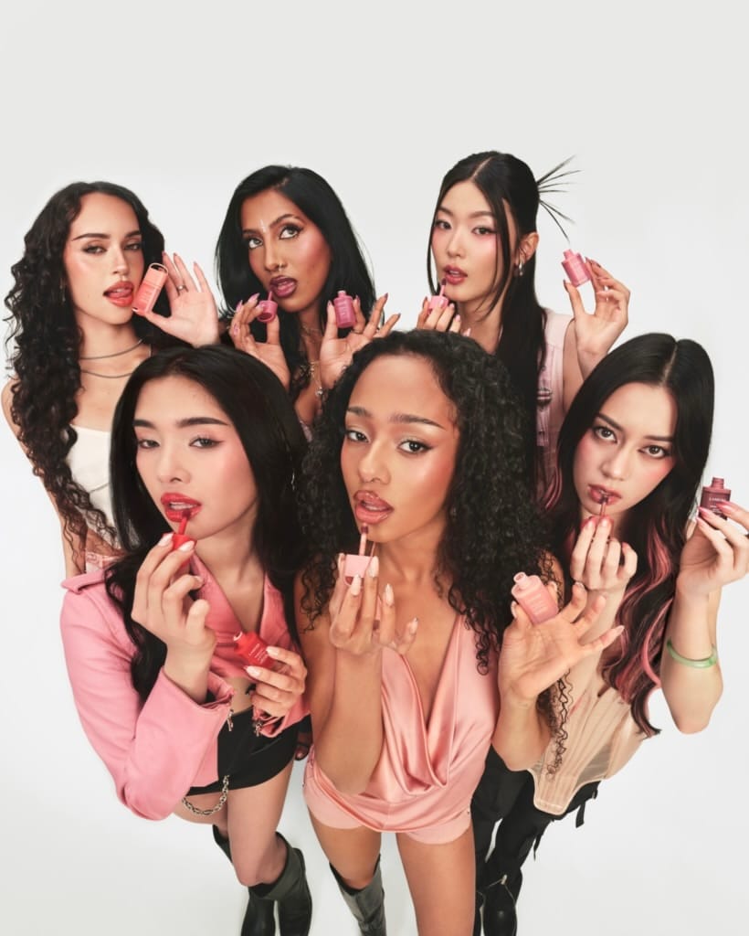 LANEIGE lip tint product photo: rosy pink and coral red, skin, soft light, image 1 of 7
