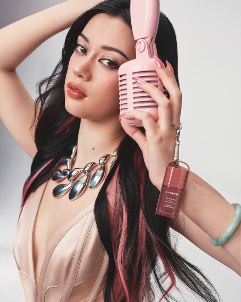 LANEIGE lip tint product photo: rosy pink and coral red, skin, soft light, image 4 of 7