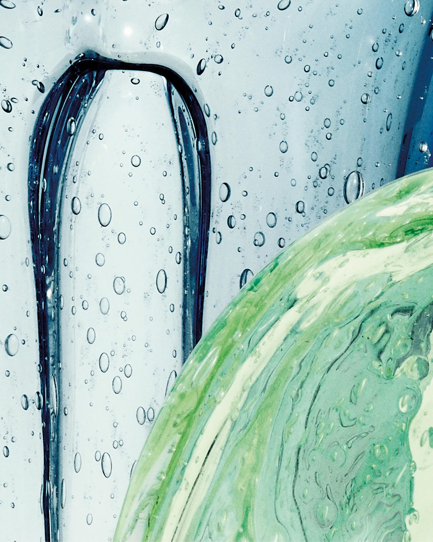 Loewe perfume product photo: clear glass, plum purple, aqua blue and sage green, glass, studio light, image 2 of 3