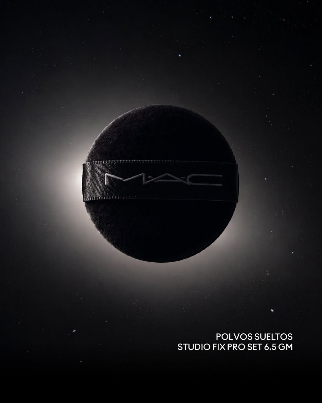 MAC Cosmetics moon landing campaign product photo: jet black, launch red, chrome silver and bronzer brown, metal and fabric, dramatic light, image 2 of 3