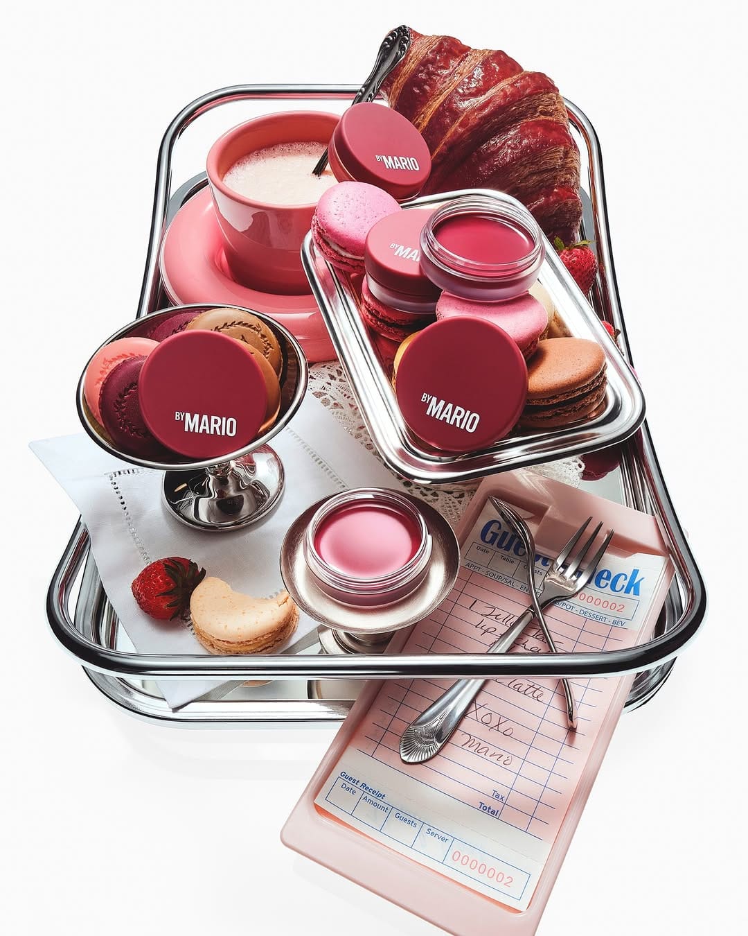 Makeup by Mario's jelly balm product photo: coral pink and cherry red, glass, soft light, image 7 of 8