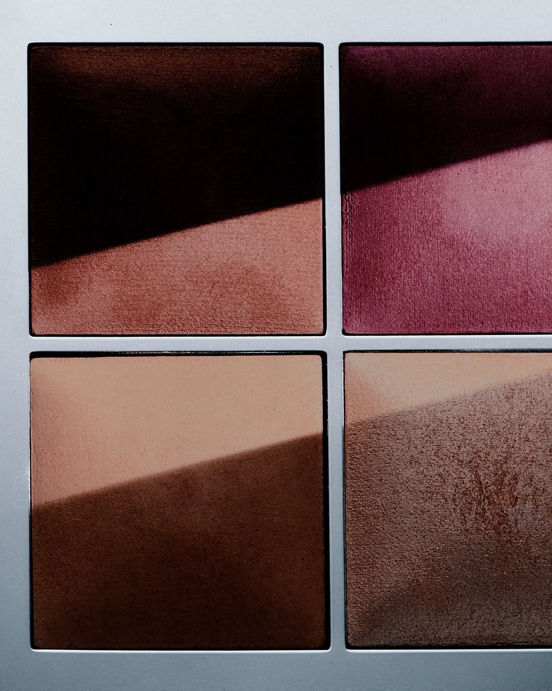 Mecca Cosmetica product photo: chrome silver, black, berry pink and rosewood, metal, studio light, image 1 of 6