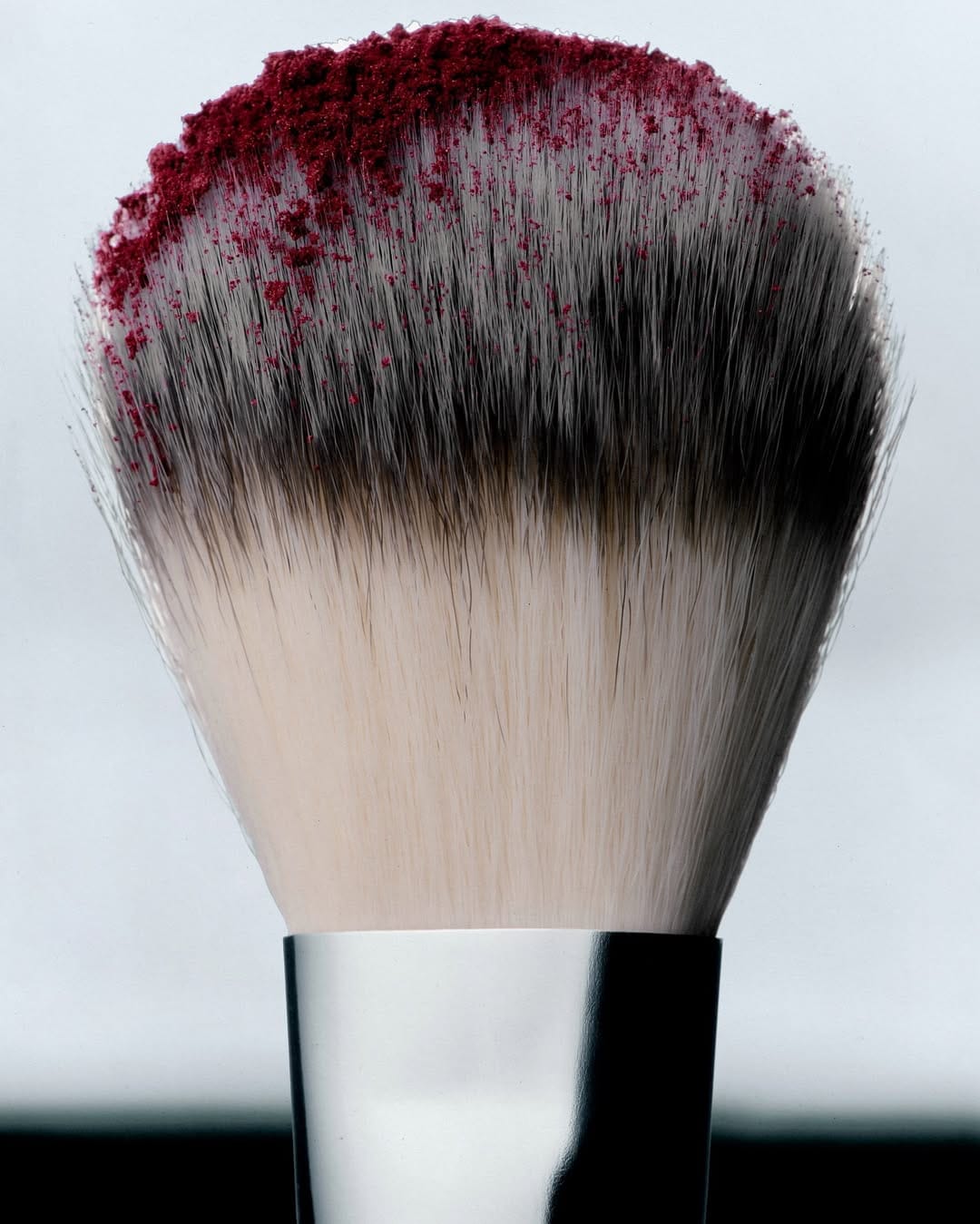 Mecca Cosmetica product photo: chrome silver, black, berry pink and rosewood, metal, studio light, image 6 of 6