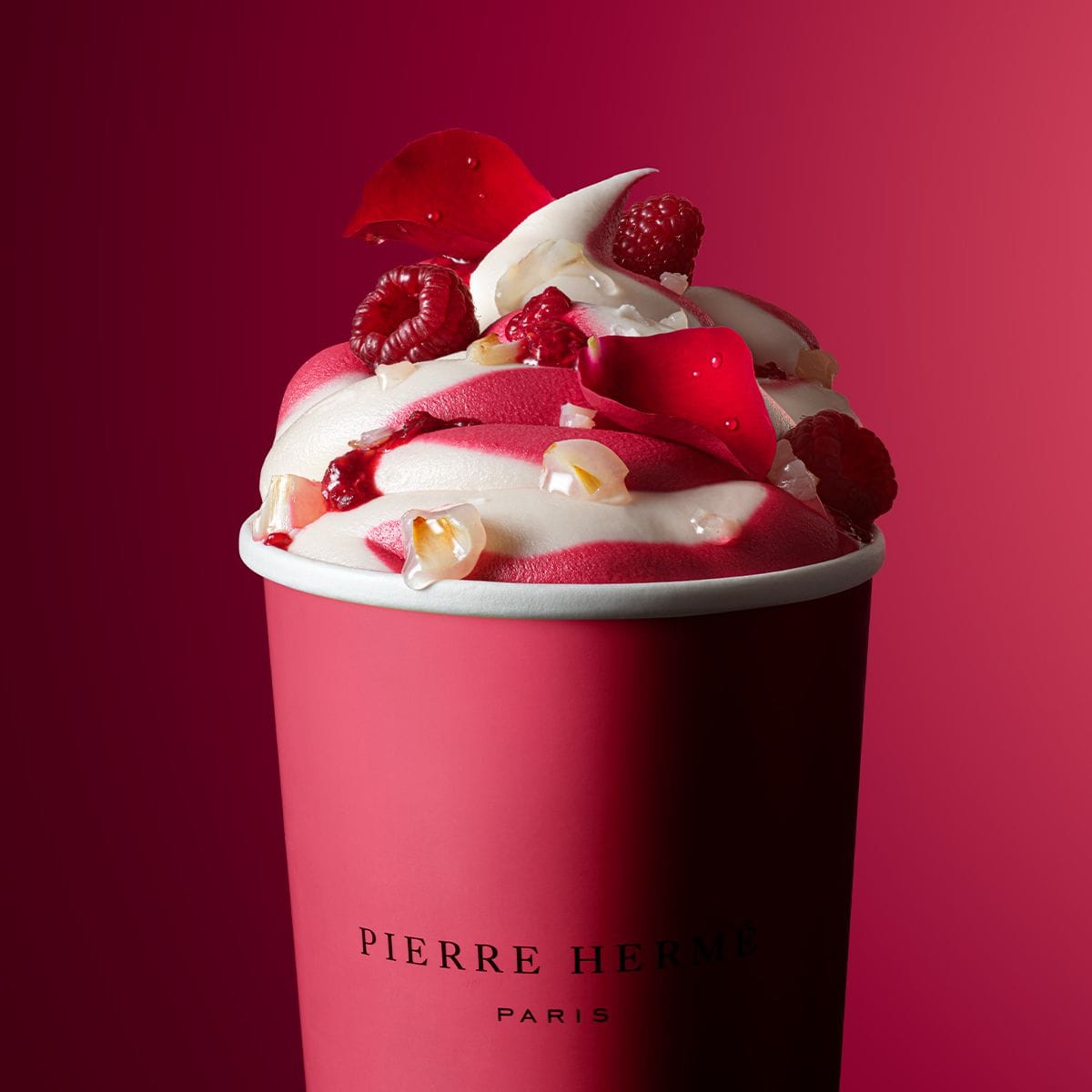 Pierre Hermé macarons product photo: sage green, sky blue, mustard and raspberry pink, paper, soft light, image 5 of 6