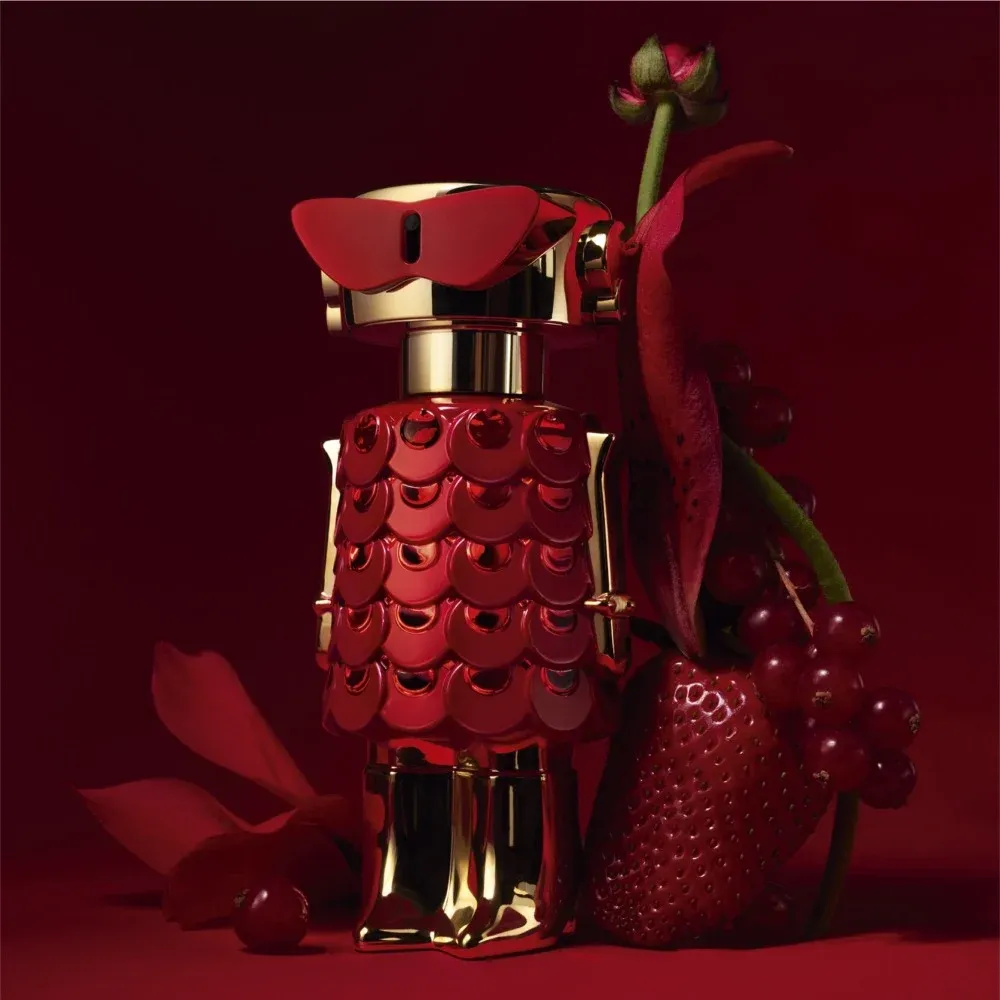 Rabanne Fame In Love product photo: crimson, gold and deep burgundy, metal and plastic, dramatic light, image 1 of 3