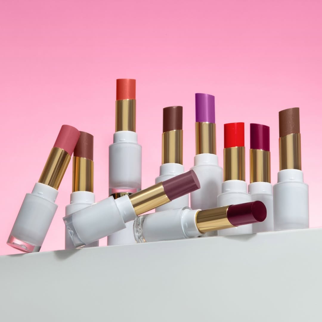 Revlon Super Lustrous product photo: white, gold, brick red and chocolate, plastic, soft light