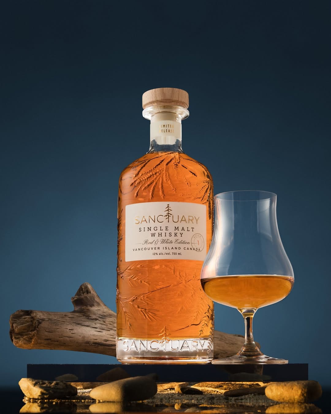 Sanctuary Whisky product photo: amber whisky, dark honey and cork, glass and stone, dramatic light, image 2 of 2