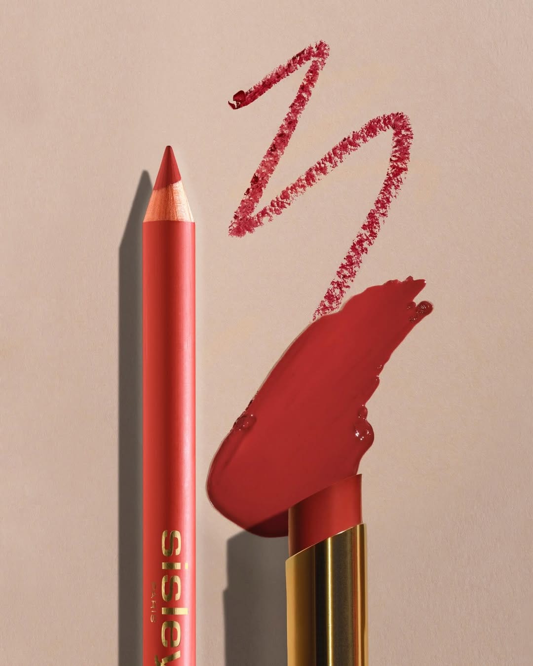 Sisley Paris lipstick product photo: gold, poppy red, chocolate brown and rosewood, metal, soft light, image 6 of 6