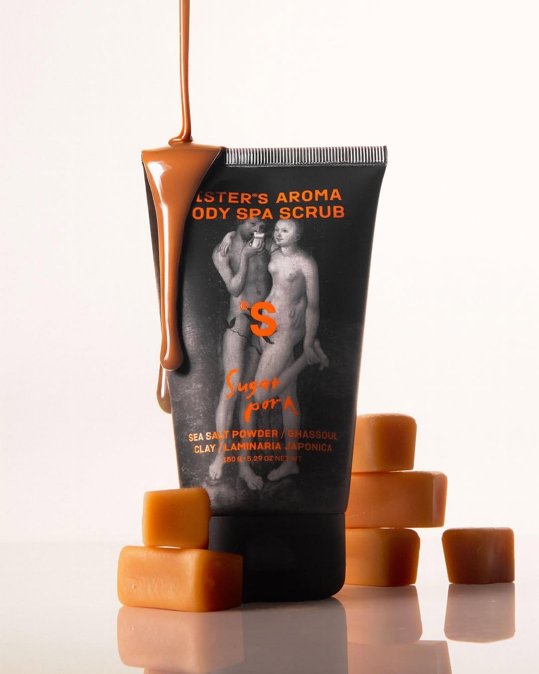 Sister's Aroma body scrubs product photo: powder blue and black, plastic, soft light, image 2 of 2