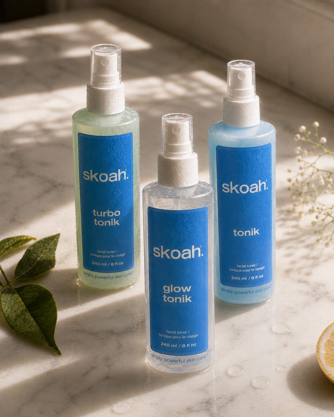Skoah Tonik trio product photo: cobalt blue, clear glass and white, plastic and stone, natural light