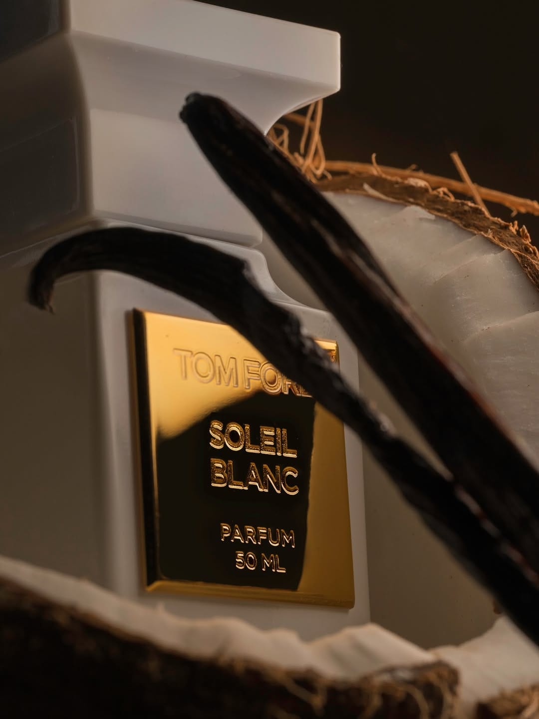 Tom Ford fragrance photography product photo: ivory white, brushed gold and espresso, glass and organic, dramatic light, image 5 of 9