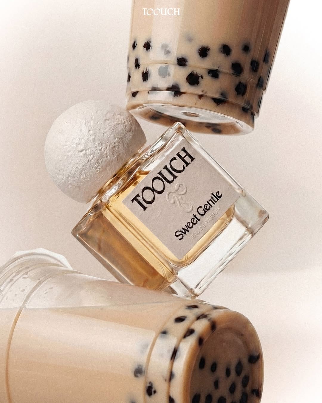 Toouch Scent product photo: milk tea, chalk white and amber, glass and wood, soft light, image 2 of 2