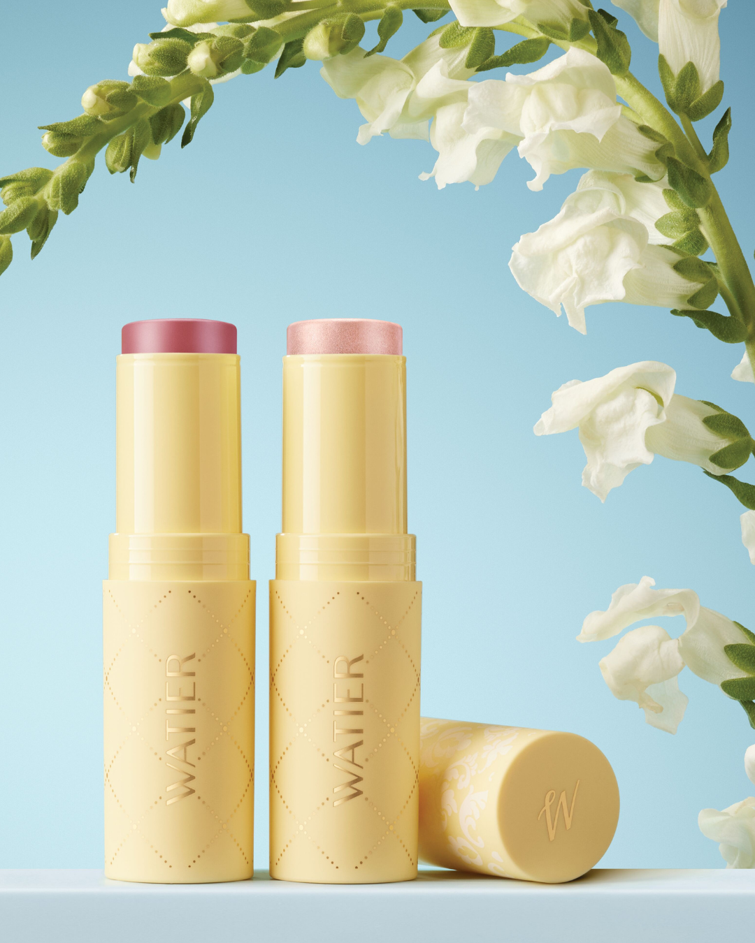Watier Cosmétiques product photo: butter yellow, cream and rose tint, plastic, soft light