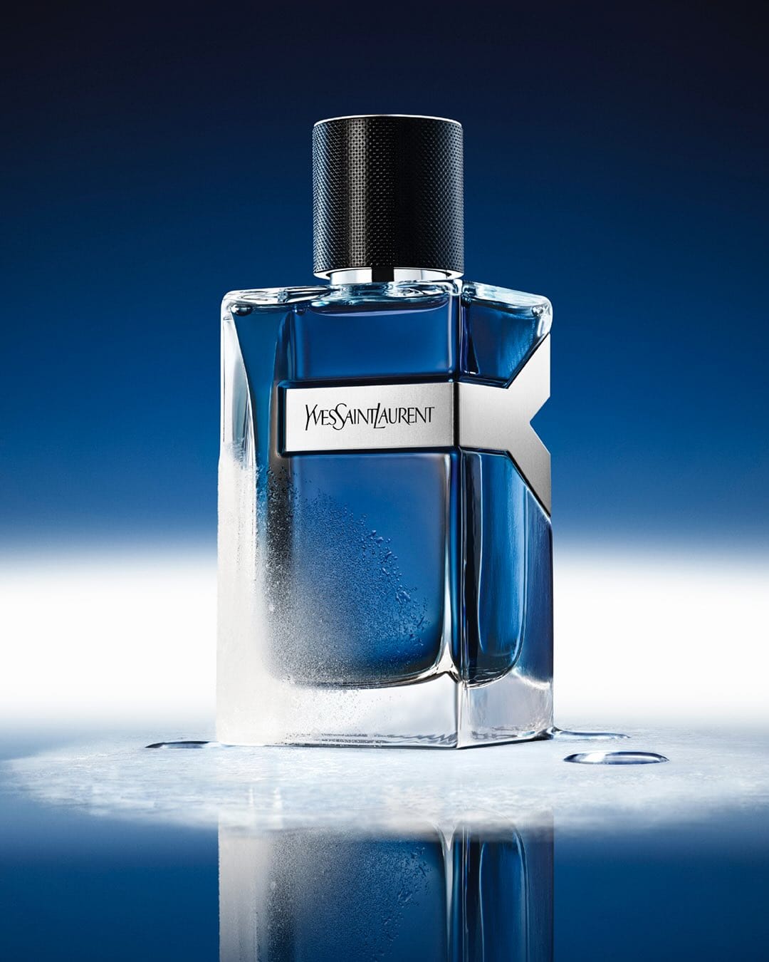 YSL Beauty Iced Cologne product photo: ice blue, black cap and silver label, organic, dramatic light