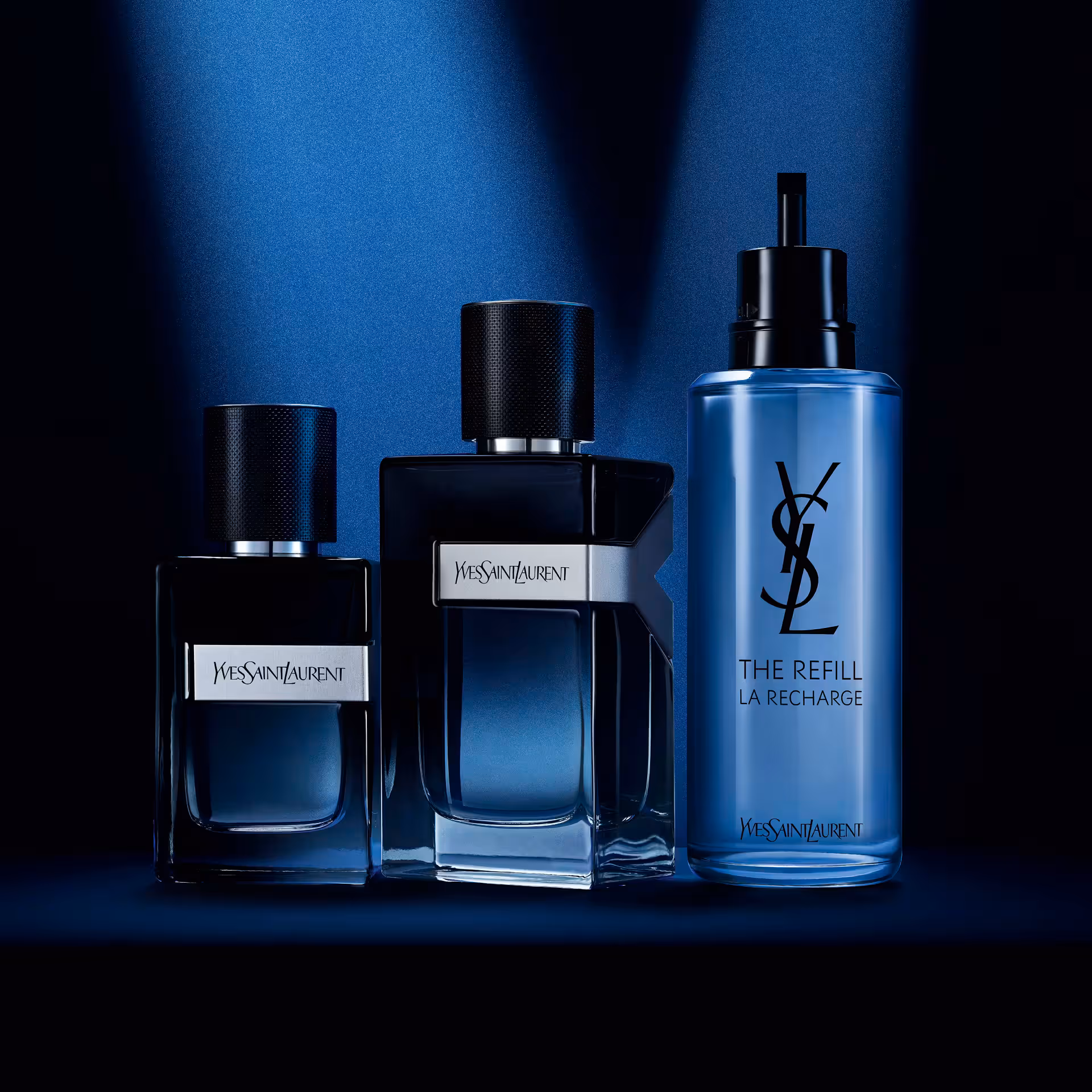 YSL Y Eau de Parfum product photo: midnight black, deep blue and silver, glass, studio light