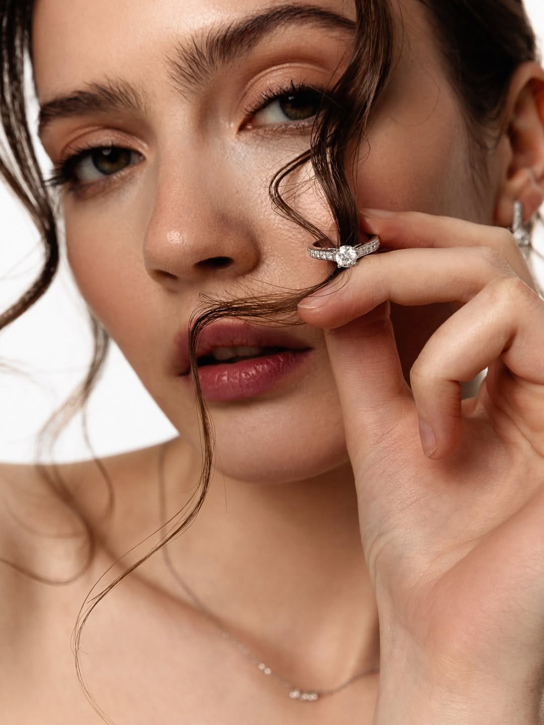 ZARINA Jewelry product photo: white gold and ruby red, skin and organic, soft light, image 2 of 7