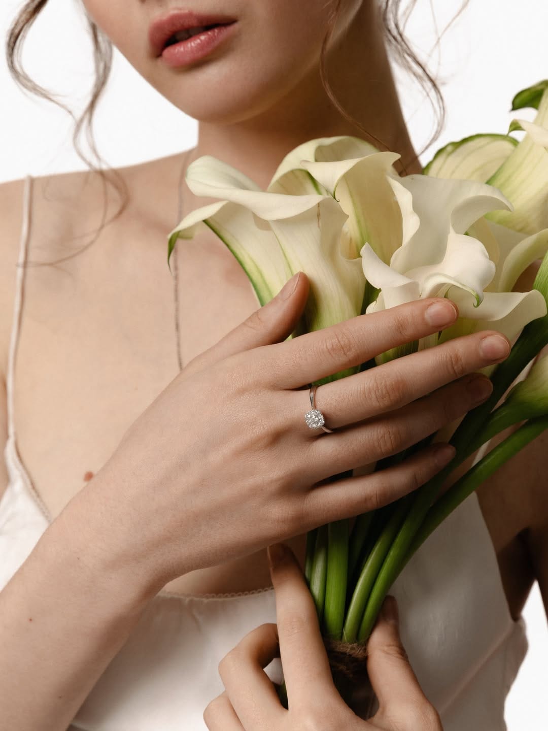 ZARINA Jewelry product photo: white gold and ruby red, skin and organic, soft light, image 6 of 7